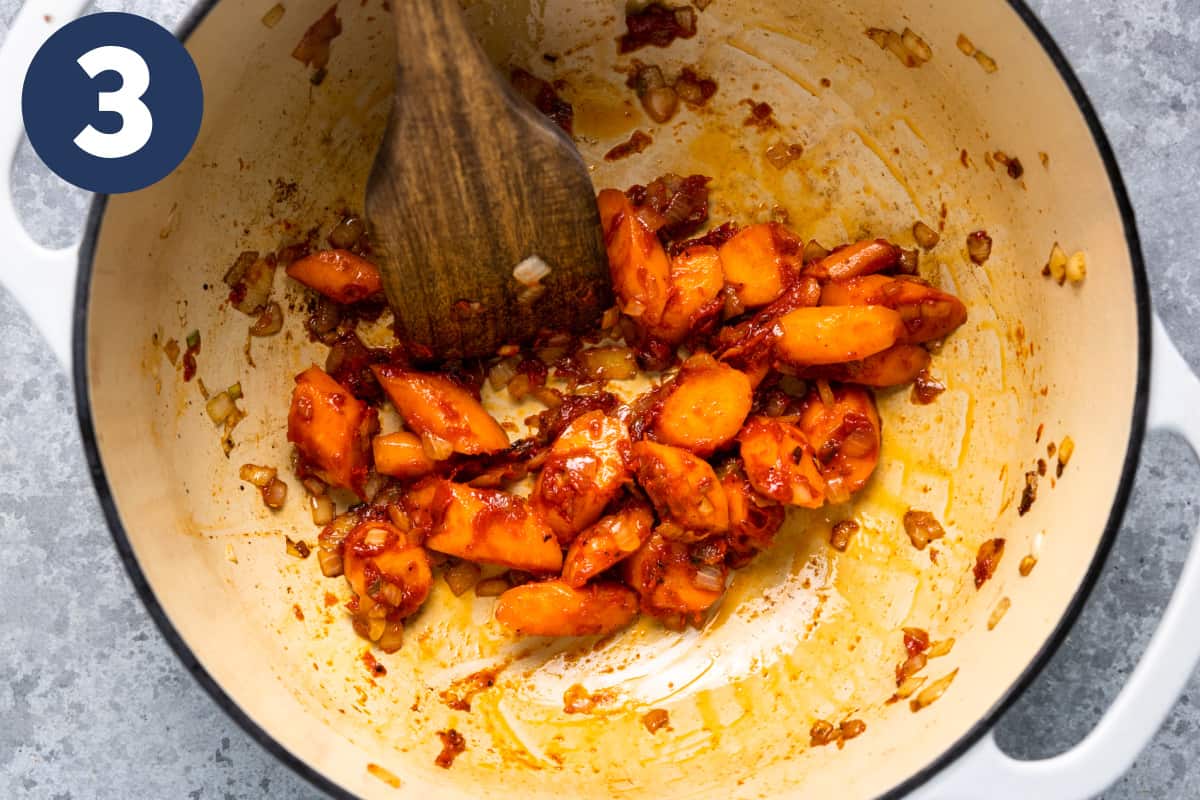 Sautéd carrots and onion in a dutch oven.