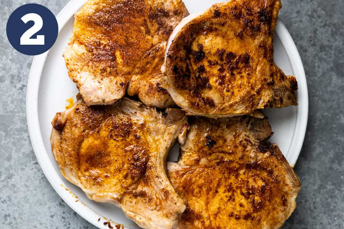 Plate of seared pork chops.