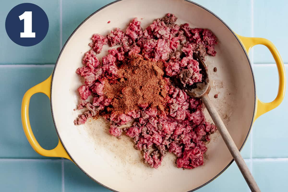 Ground beef with taco seasoning in a skillet. 