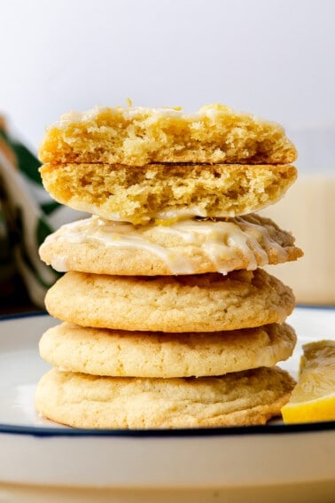 Stack of lemon cookies with glaze.