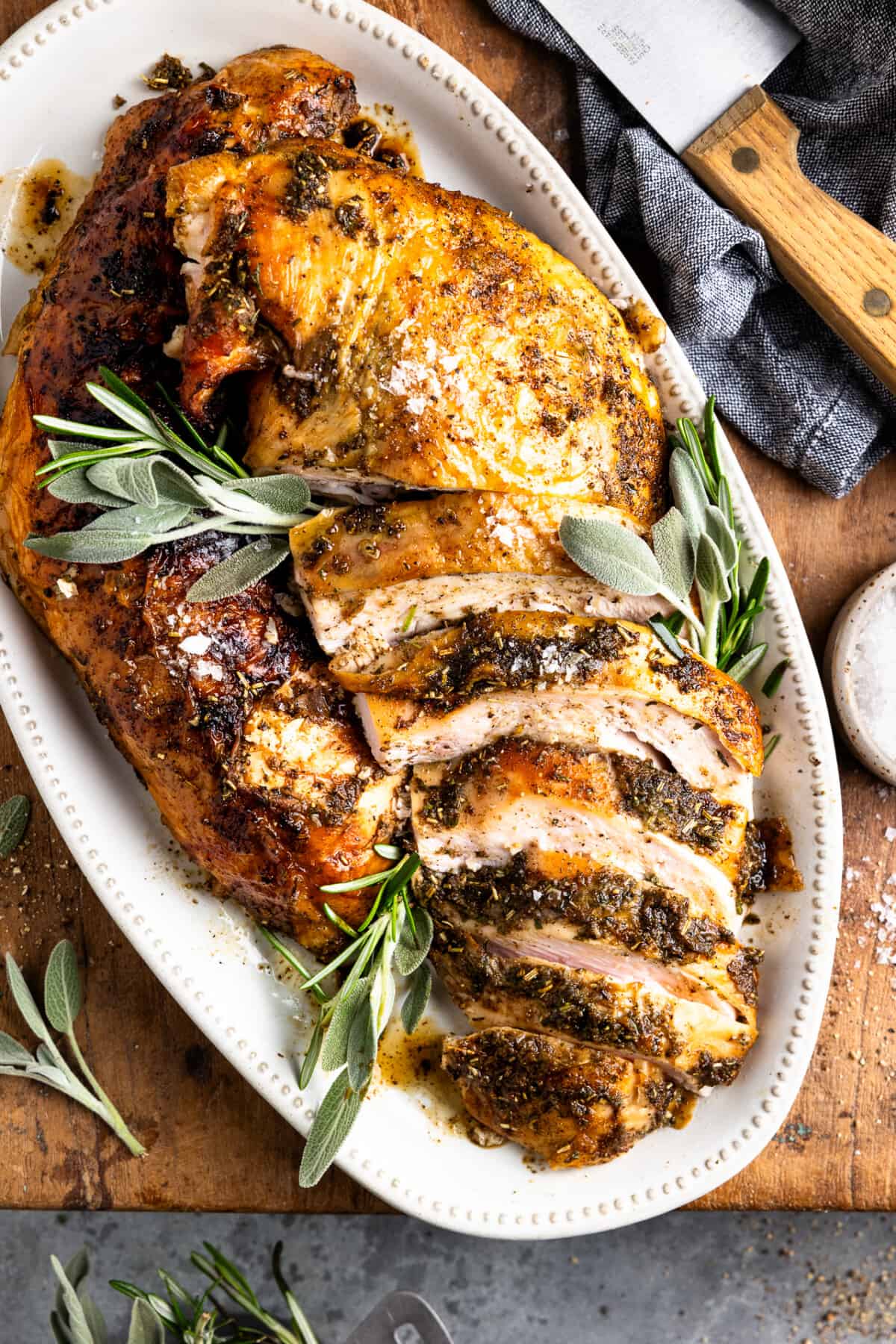 Sliced smoked turkey breast served on a platter. 