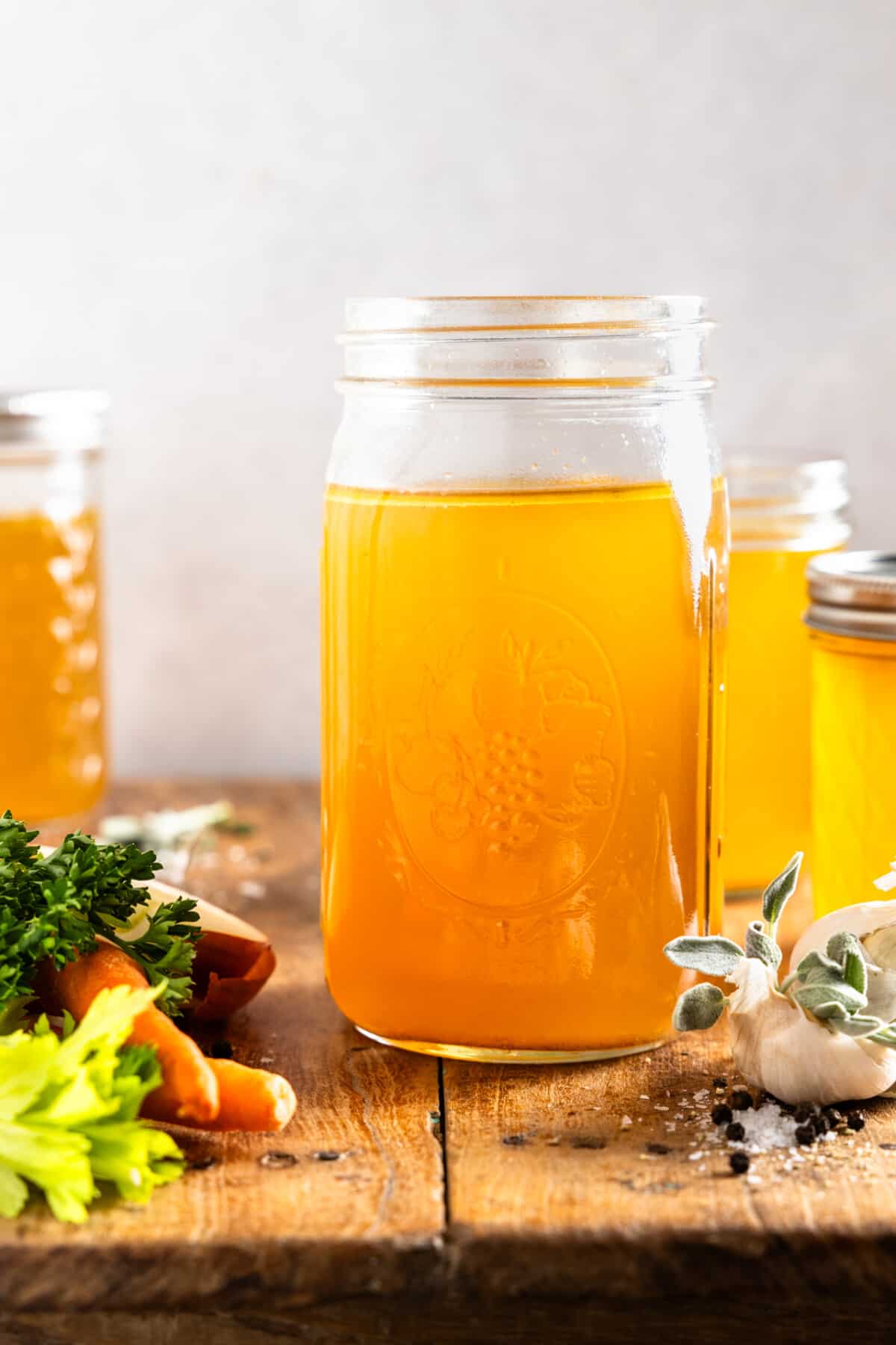 Jar filled with homemade turkey broth.