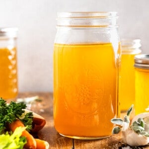 Jar filled with homemade turkey broth.