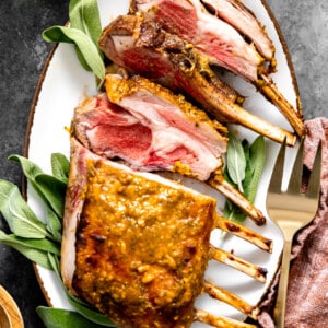 Sliced rack of lamb on a plate.