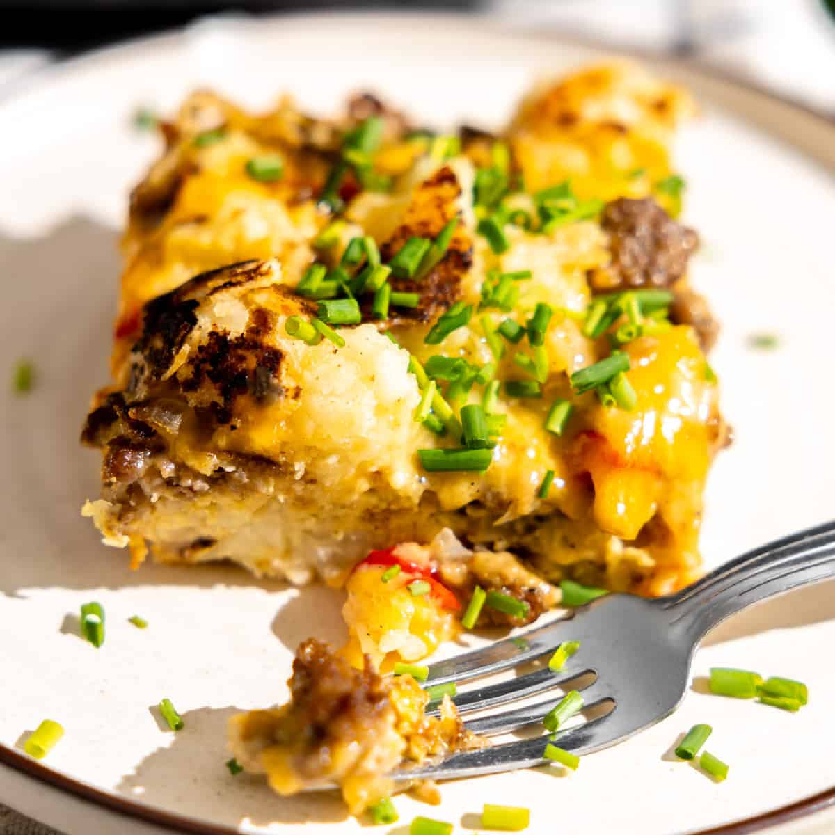 Serving of hashbrown breakfast casserole on a plate.