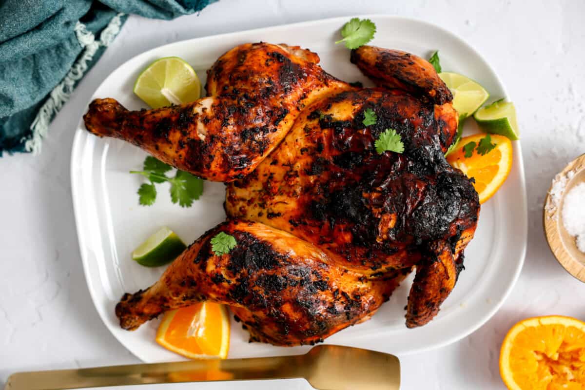 Grilled pollo asado on a plate. 
