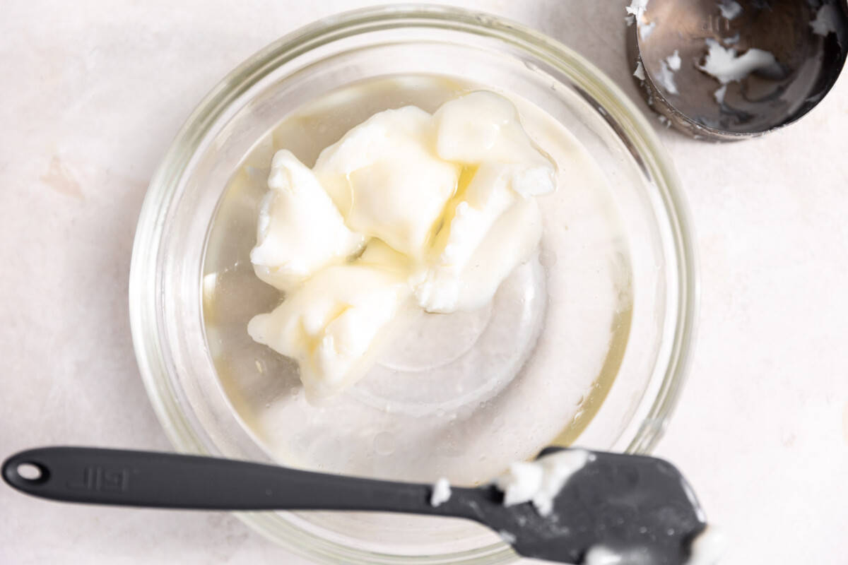 Lard melting in a bowl of warm water.