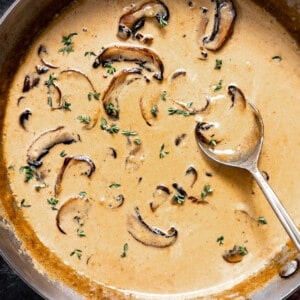 Skillet with creamy mushroom sauce for steak.
