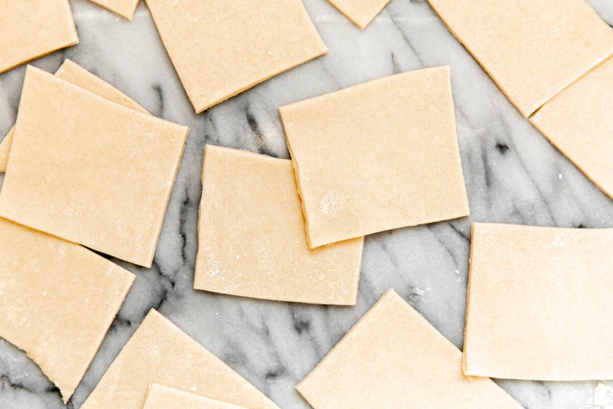 Squares of dough resting.