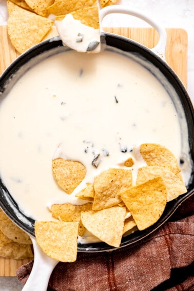 Skilled with white queso served with tortilla chips.