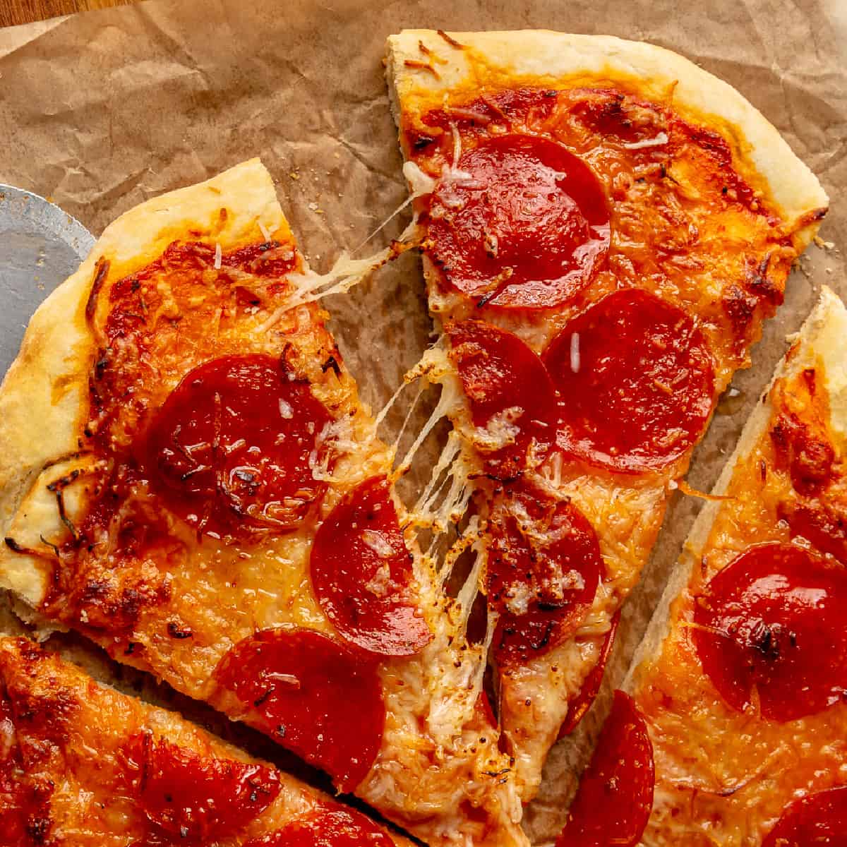 Sliced pepperoni pizza on no yeast dough. 