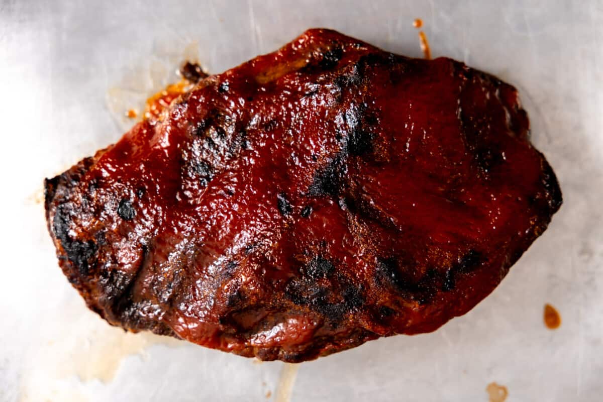 Slow Cooked beef brisket with bbq sauce. 
