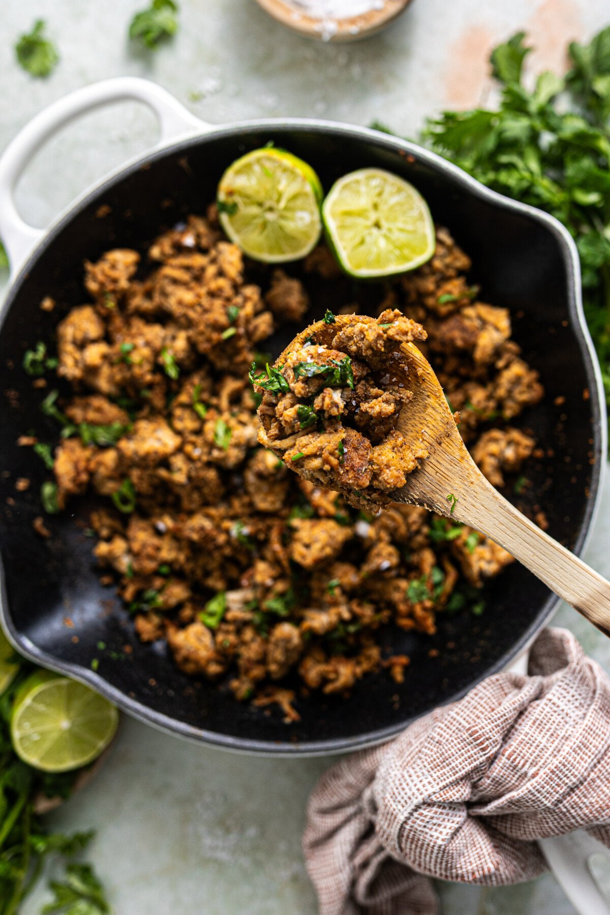 Skillet with ground cilantro lime chicken. 